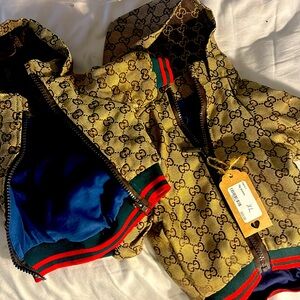I have two nice Gucci jackets never worn for small dogs like a yorkie